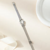 Alice - Elegant Gold Oval Timepiece