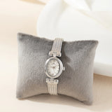 Alice - Elegant Gold Oval Timepiece