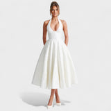 Inès - Textured Midi Dress" can be rewritten as "Inès - Stylish Textured Midi Dress.
