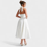 Inès - Textured Midi Dress" can be rewritten as "Inès - Stylish Textured Midi Dress.