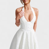 Inès - Textured Midi Dress" can be rewritten as "Inès - Stylish Textured Midi Dress.