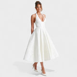 Inès - Textured Midi Dress" can be rewritten as "Inès - Stylish Textured Midi Dress.