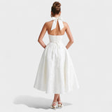 Inès - Textured Midi Dress" can be rewritten as "Inès - Stylish Textured Midi Dress.