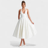 Inès - Textured Midi Dress" can be rewritten as "Inès - Stylish Textured Midi Dress.