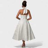 Inès - Textured Midi Dress" can be rewritten as "Inès - Stylish Textured Midi Dress.
