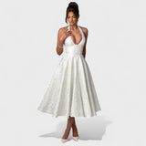 Inès - Textured Midi Dress" can be rewritten as "Inès - Stylish Textured Midi Dress.