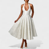 Inès - Textured Midi Dress" can be rewritten as "Inès - Stylish Textured Midi Dress.