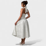 Inès - Textured Midi Dress" can be rewritten as "Inès - Stylish Textured Midi Dress.