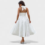 Inès - Textured Midi Dress" can be rewritten as "Inès - Stylish Textured Midi Dress.