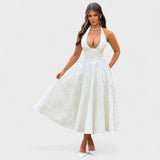Inès - Textured Midi Dress" can be rewritten as "Inès - Stylish Textured Midi Dress.