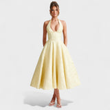 Inès - Textured Midi Dress" can be rewritten as "Inès - Stylish Textured Midi Dress.
