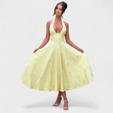 Inès - Textured Midi Dress" can be rewritten as "Inès - Stylish Textured Midi Dress.